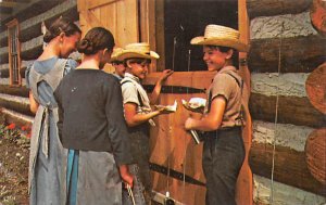 Amish Boys and Girls enjoying a treat Lancaster, Pennsylvania PA  