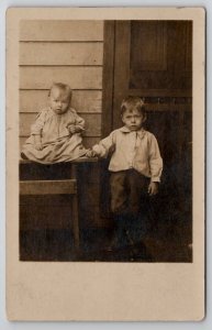 RPPC Scruffy Little Children Baby Boy Sad Eyes Postcard H21