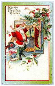 1910 Christmas Wishes Santa Claus Stockings Holly Berries Embossed Postcard