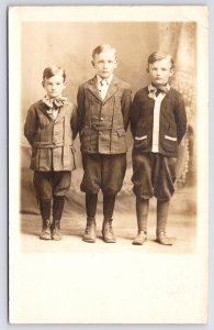 RPPC Dignified Brothers Three~Knit Cardigan Sweater~Big Bow~Knickerbockers~1914