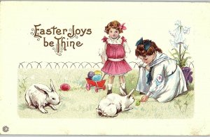C.1910 Adorable Kids w/ Rabbits Colored Easter Eggs Postcard F48