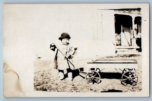 c1910's Little Kid With Wagon House Scene RPPC Photo Unposted Antique Postcard