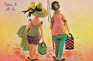 Couple Walking With Fishing Pole Taking It All In