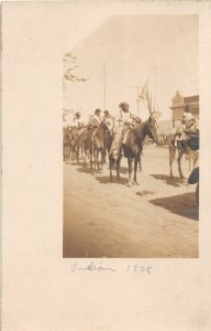 H74/ Interesting RPPC Postcard c1908 Native American Indian Parade Horses224
