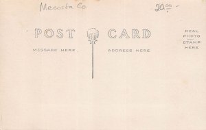 J72/ Millbrook Michigan RPPC Postcard c1910 Mill Hardware High School 293