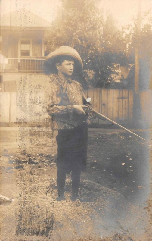 RPPC Boy Holding Rifle, Long Beach, CA Cowboy 1907 Vintage Photo Postcard