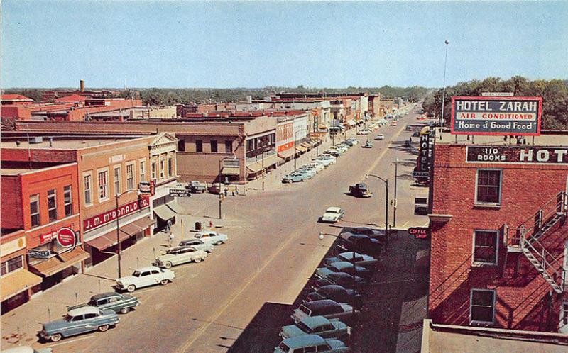 Great Bend KS Street View Store Fronts Billboards Old Cars Postcard