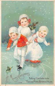 CHRISTMAS HOLIDAY CHILDREN SKATING EMBOSSED POSTCARD (c. 1910)