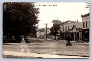 J90/ Juneau Wisconsin RPPC Postcard c1910-20 Oak Street Stores 475