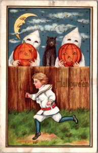 Halloween Young Boy and Pumpkins