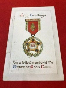 1918 embossed postcard SANTA Jolly Greetings The Order of Good Cheer medal