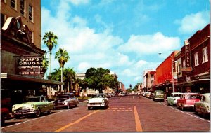 Postcard FL Bradenton Business Section Drug Store Classic Cars Shops 1956 V34
