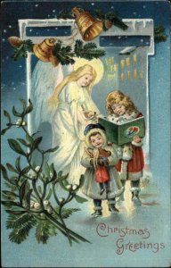 Christmas Children Caroling Guardian Angel Watches Over c1910 Postcard