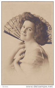 RP; Portrait of woman holding hand fan, 10-20s