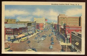 h2289 - FARGO North Dakota Postcard 1940s Broadway. Stores Old Cars