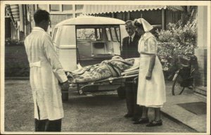 Dutch Doctor Nurse Ambulance Patient Vintage Postcard c1930