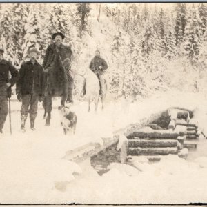 c1910s OOAK Winter Snow Outdoor RPPC Log Bridge White Horse Holace John? PC A245