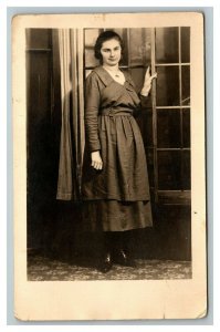 Vintage 1920's RPPC Postcard - Portrait of Woman in Dress in Front of Door