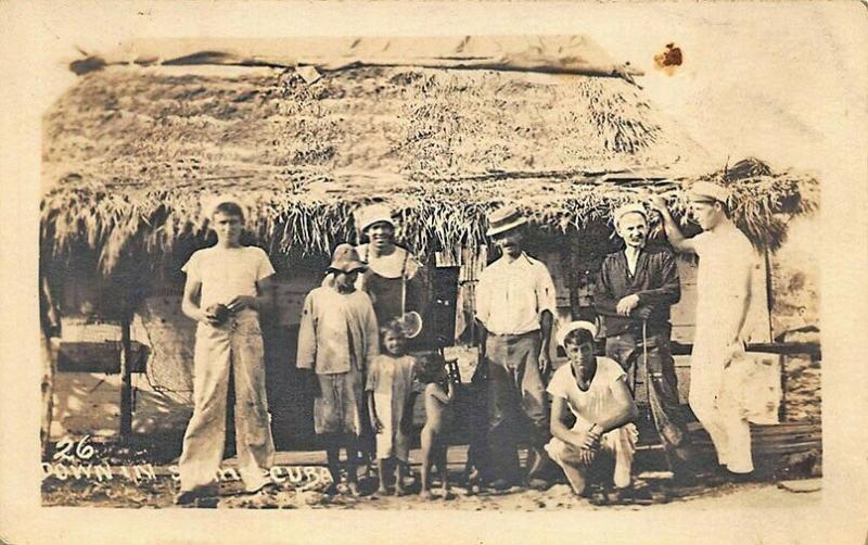 Down in Sunny Cuba Natives & Sailors Thatched Roof Home Real Photo Postcard