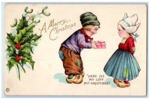 c1910's Christmas Dutch Kid Giving Gift Berries Mistletoe Fresno CA Postcard