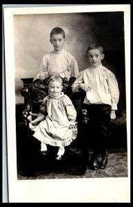 1911 Three Little Boys Children with Teddy Bear Studio RPPC Real Photo Postcard