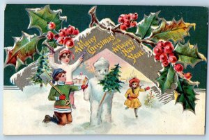 Christmas New Year Postcard Children Snowman Holly Berries Embossed 1910 Antiqe