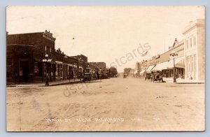 J90/ New Richmond Wisconsin RPPC Postcard c1910 Main Street Stores 103