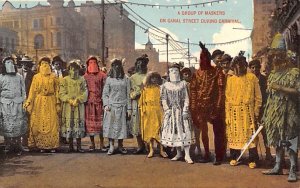 Group of Maskers on Canal Street during Carnival New Orleans, LA USA Parade U...