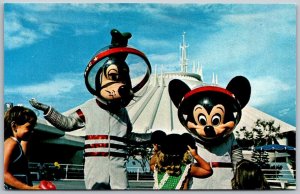 WALT DISNEY WORLD Florida Postcard Welcome To The Future Mickey Goofy Space Suit