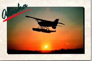 Alaska Float Plane Flying Into The Sunset 1995