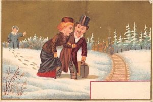 Approx. Size: 3 x 4.25 Man and woman walking through the snow to the train  L...