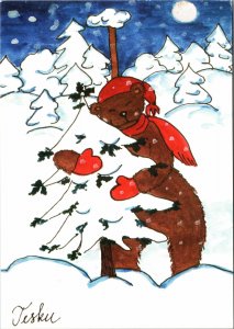 VINTAGE CONTINENTAL SIZE POSTCARD CHRISTMAS GREEINGS BEAR HUGGING TREE FINLAND