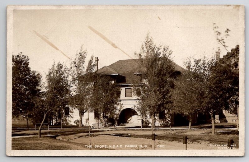 RPPC Fargo ND North Dakota The Shops N.D.A.C. Agriculture College Postcard I26