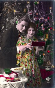 Postcard Christmas Joyeux Noel Photo tinted Couple at Christmas CEKO 1934 set 