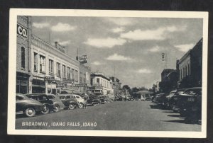 IDAHO FALLA IDAHO DOWNTOWN BROADWAY STREET SCENE OLD CARS VINTAGE POSTCARD