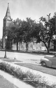 Jefferson South Dakota~Catholic Church~Classic Car in Street~Lamppost~1940s RPPC