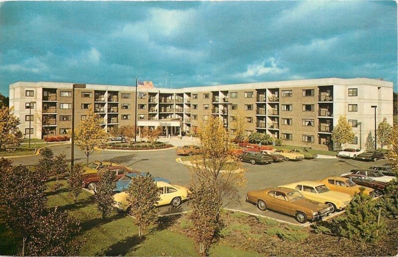 Grand Rapids MI~Breton Village Green Apts~Parking Lot c1970 Gold Plymouth Duster