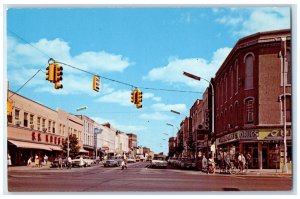 1960 Busy Day Classic Cars Building Street Road Monroe Michigan Vintage Postcard