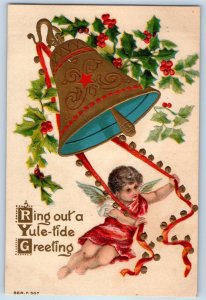 c1910's Christmas Greeting Angel Ringing Bell Holly Berries Embossed Postcard