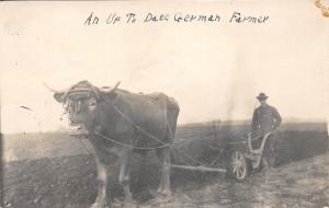 D8/ Foreign Postcard Germany c1910 RPPC Real Photo Up To Date Farmer Plow Cow