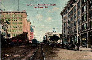PC D Street, Street Car Trolley, US Grant Hotel on Left Downtown San Diego CA