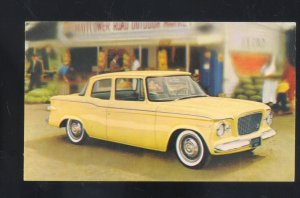 1960 STUDEBAKER SMART LARK SEDAN AUGUSTA MAINE CAR ADVERTISING POSTCARD