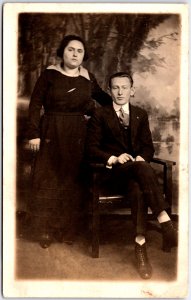 Man and Woman in Formal Dress Attire, Front of Tree Backdrop - Vintage Postcard