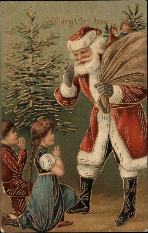 Christmas Little Girl and Boy Kneeling by Santa Claus Gilt Inlay c1910 Postcard