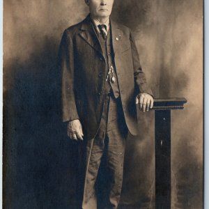 c1910s Frowing Gentleman Portrait RPPC Sad Man Wood Hand Table Pedestal Vtg A213