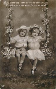 Charming children blossom floral swing fantasy greetings photo postcard 1910s 