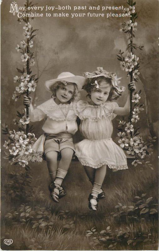 Charming children blossom floral swing fantasy greetings photo postcard 1910s 