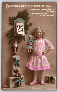EAS Christmas~Blonde Girl In Pink w/Dolly~Gift Tree~25 Cal Pg~Art Photo c1910