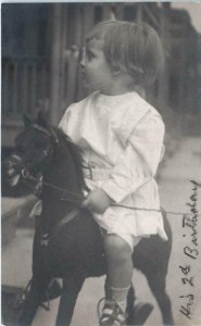 RPPC  ST LOUIS, MO Missouri   CUTE BOY on ROCKING HORSE  c1910 Postcard