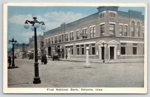 Oelwein Iowa~First National Bank Corner~Businesses Down Street~Autos~1929 PC 